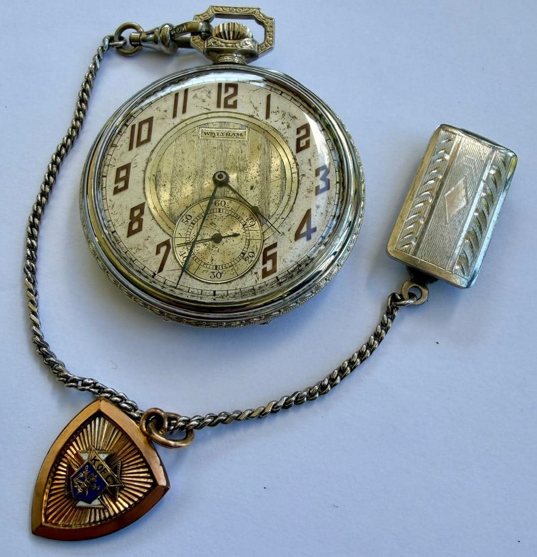 Art Deco Waltham 7-Jewel Pocket Watch, 14K Gold-Filled Case, K of C Fob, Working: American Waltham pocket watch, circa 1920s–1930s, featuring a distinctive Art Deco dial with large stylized Arabic numerals, subsidiary seconds dial at 6 o’clock, and geometric vertically decorate
