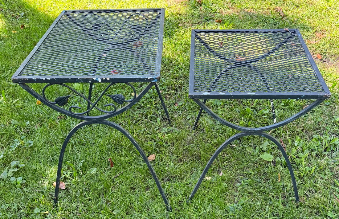 Pair of Vintage Wrought Iron & Expanded Metal Patio Side Tables: Pair of vintage black-painted wrought iron patio or garden side tables, each featuring an expanded diamond-mesh metal top supported on gracefully curved legs. The larger rectangular table is embellish