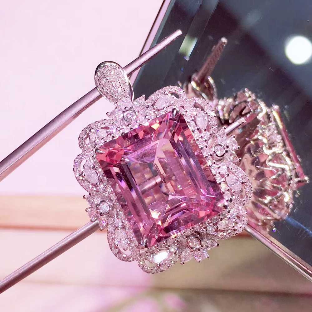 14ct Full Body Morganite Ring: 14ct Full Body Morganite RingBody Material MorganiteOther materials 18K gold diamondWeight Bare stone is about 14 carats, total weight is about 16.96 gramsSize The size of the bare stone is about 14.9