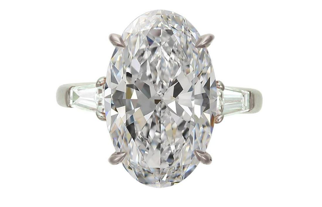 GIA Certified 7.02 Carat Oval Diamond Tapered Baguette Ring (1 of 1)