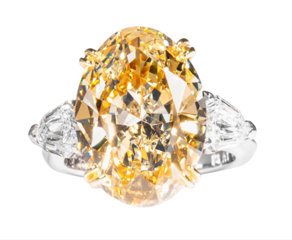 GIA Certified 10.09 Carat Fancy Yellow Oval Diamond Ring (1 of 1)