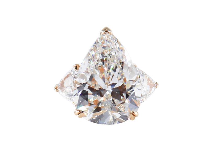 GIA Certified 11.22 Carat G SI1 Pear Shape Diamond Three-Stone Ring (1 of 1)