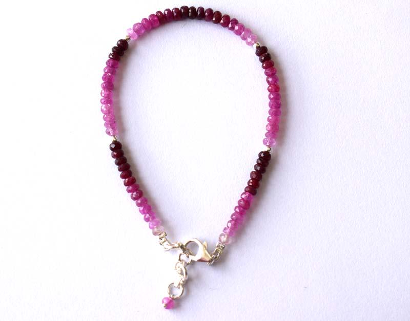 NATURAL RUBY BRACELET W/ 925 SILVER: These are Natural , earth mined SHADED RUBY beads finished with SOLID 925 Sterling Silver lobster clasp. Clasp is adjustable from 7.5" to 8"