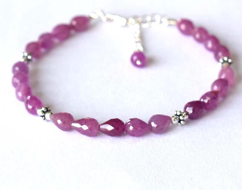 NATURAL PINK SAPPHIRE BRACELET W/ 925 SILVER: These are Natural , earth mined PINK SAPPHIRE beads finished with SOLID 925 Sterling Silver lobster clasp. Clasp is adjustable from 7" to 8"