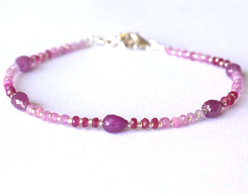 NATURAL PINK SAPPHIRE BRACELET W/ 925 SILVER: These are Natural , earth mined PINK SAPPHIRE beads finished with SOLID 925 Sterling Silver lobster clasp. Clasp is adjustable from 7" to 8"