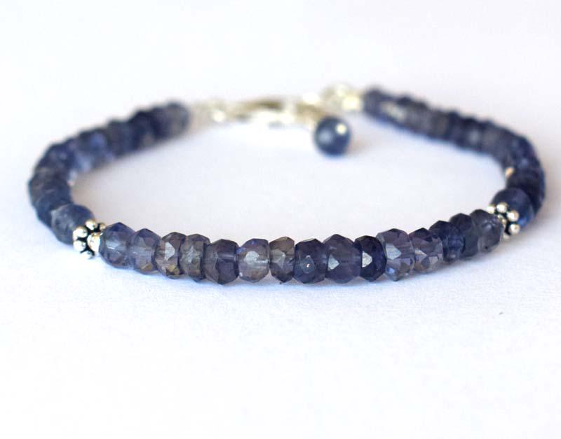 NATURAL IOLITE BRACELET W/ 925 SILVER: These are Natural , earth mined IOLITE beads finished with SOLID 925 Sterling Silver lobster clasp. Clasp is adjustable from 6.5" to 7.5"