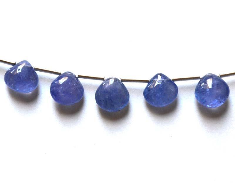 TANZANITE - HEARTS 6.5 - 7 mm - TASSEL: " TASSEL"- means the drilled pieces of gemstones are loosely attached with a wire , ideally you can use it to create of of a kind jewelry . STONE : NATURAL EARTH MINED TANZANITE SMOOTH HEART SHAPE BEA