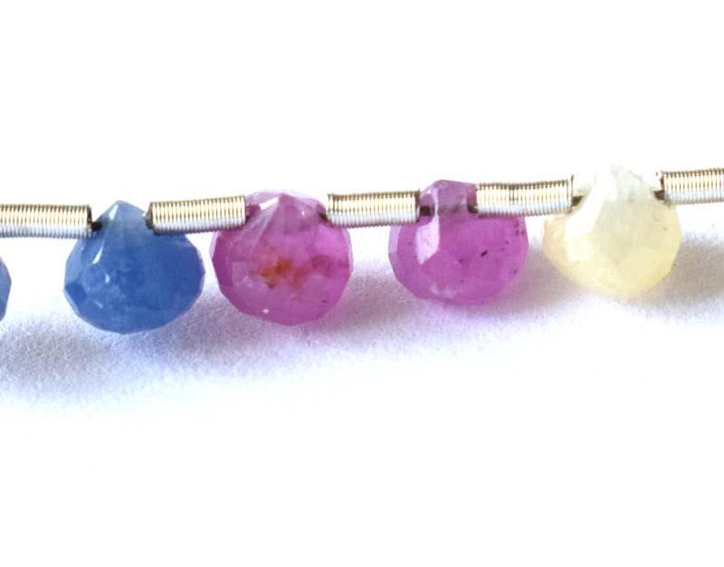 SAPPHIRE BEADS- FACETED ONION 4 mm - TASSEL: " TASSEL"- means the drilled pieces of gemstones are loosely attached with a wire , ideally you can use it to create of of a kind jewelry . STONE : NATURAL EARTH MINED RARE MULTI SHADES OF SAPPHIRE FA