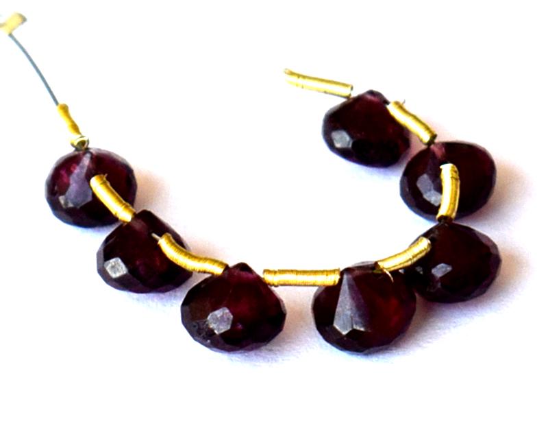 GARNET BEADS - ONION SHAPE 6 mm - TASSEL: " TASSEL"- means the drilled pieces of gemstones are loosely attached with a wire , ideally you can use it to create of of a kind jewelry . STONE : NATURAL EARTH MINED GARNET FACETED ONION SHAPE BEADS