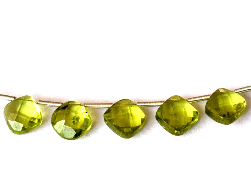 PERIDOT -CUSHION CHECKERD 7 mm - TASSEL: " TASSEL"- means the drilled pieces of gemstones are loosely attached with a wire , ideally you can use it to create of of a kind jewelry . STONE : NATURAL FINE ARIZONA PERIDOT CUSHION SHAPE BEADS . A