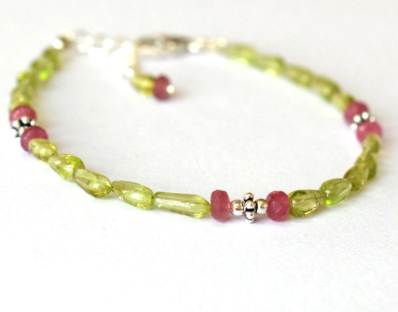 PERIDOT AND TOURMALINE BRACELET W/ 925 SILVER: These are Natural , earth mined PERIDOT AND TOURMALINE beads finished with SOLID 925 Sterling Silver lobster clasp. All chains and spacers are also Solid 925 Sterling Silver. Clasp is adjustable from 