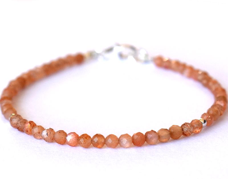 NATURAL SUNSTONE BRACELET W/ 925 SILVER: These are Natural , earth mined SUNSTONE beads finished with SOLID 925 Sterling Silver lobster clasp. All chains and spacers are also Solid 925 Sterling Silver. Length of bracelet 7"