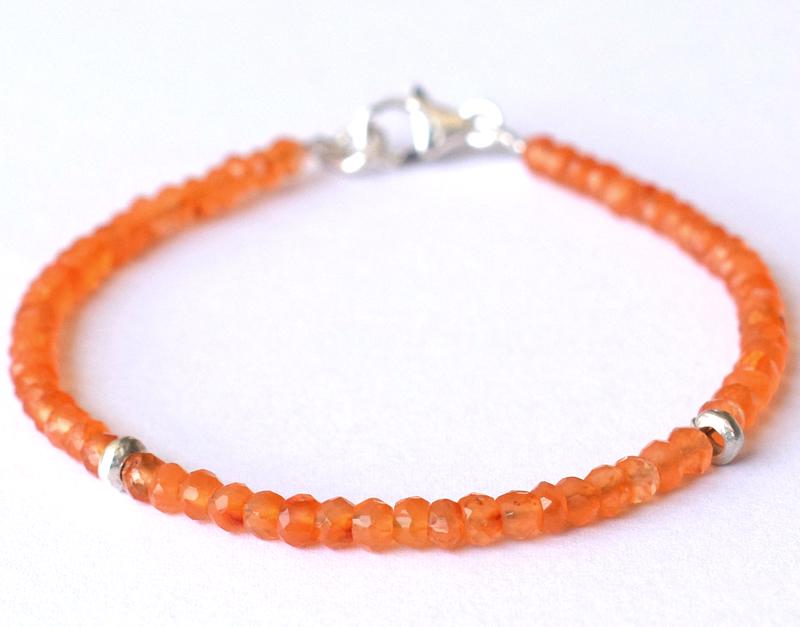 NATURAL CARNELIAN BRACELET W/ 925 SILVER: These are Natural , earth mined CARNELIAN faceted rondelle beads finished with SOLID 925 Sterling Silver lobster clasp. All chains and spacers are also Solid 925 Sterling Silver. Length of bracelet 7"