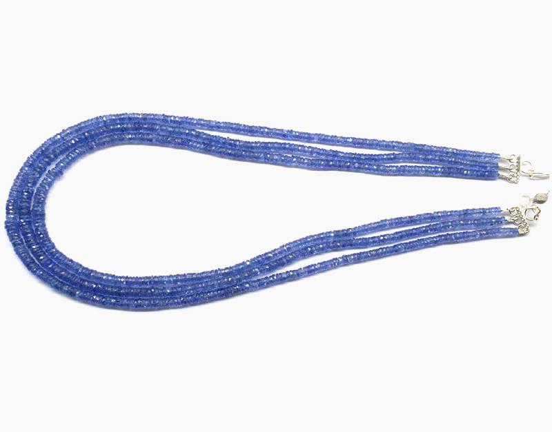 FINEST AAA TANZANITE NECKLACE ( 3 LINES ): These are Natural , earth mined and hand crafted with precision AA QUALITY TANZANITE FACETED TYRE beaded necklace with SOLID 925 Sterling Silver clasp, SIZE OF STONE = 3 - 6 mm. Width = 1 - 2 mm.Total
