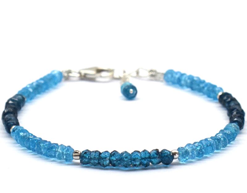 NATURAL SWISS TOPAZ BRACELET W/ 925 SILVER: These are Natural , earth mined BLUE TOPAZ faceted rondelle shape beads finished with SOLID 925 Sterling Silver lobster clasp. All chains and spacers are also Solid 925 Sterling Silver. Clasp is adjus