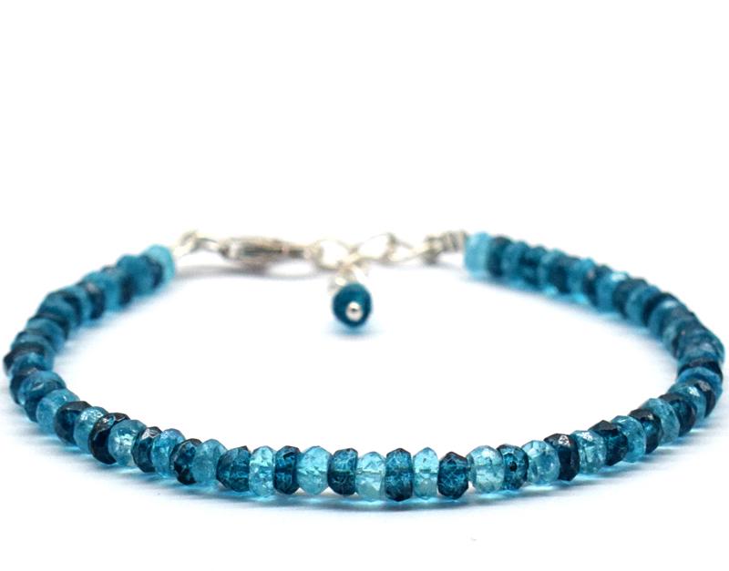 NATURAL TOPAZ BRACELET W/ 925 SILVER: These are Natural , earth mined BLUE TOPAZ faceted rondelle shape beads finished with SOLID 925 Sterling Silver lobster clasp. All chains and spacers are also Solid 925 Sterling Silver. Clasp is adjus