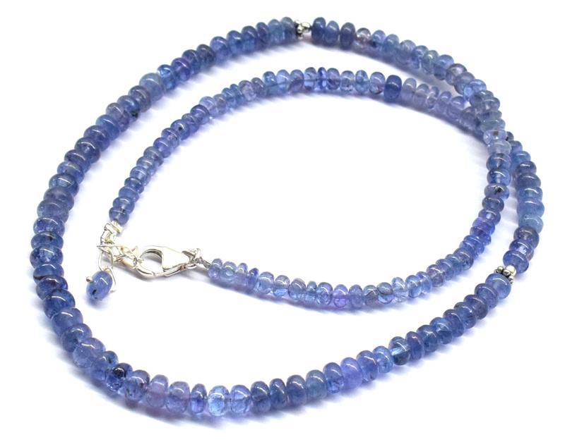 STERLING SILVER - TANZANITE 17-18" NECKLACE: These are Natural , earth mined and hand crafted with precision TANZANITE PLAIN RONDELLE beaded necklace with SOLID 925 Sterling Silver clasp, SIZE OF STONE = 3.5 - 5.5 mm . Width = 2.5 - 3.5 mm . Tot
