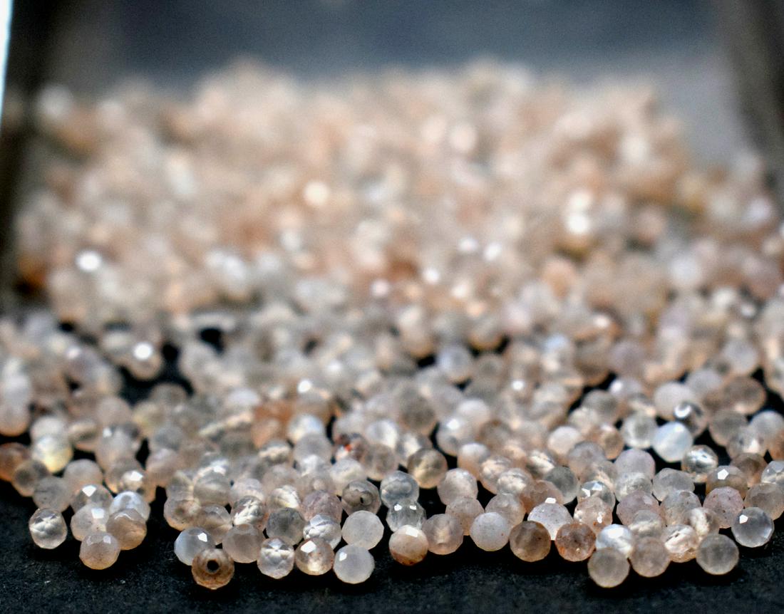 500 PIECES MOONSTONE - ROUND 2 mm - LOOSE: " LOOSE BEADS"- means the drilled pieces of gemstones , ideally you can use it to create of of a kind jewelry . STONE : NATURAL EARTH MINED FINE PEACH MOONSTONE BEADS FACETED ROUND SHAPE BEADS . All t