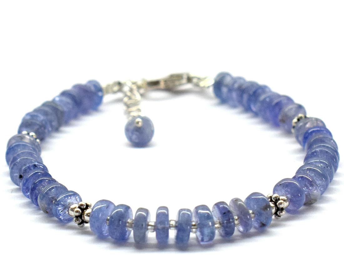 NATURAL TANZANITE BRACELET W/ 925 SILVER: These are Natural , earth mined TANZANITE heshi shape beads finished with SOLID 925 Sterling Silver lobster clasp. All chains and spacers are also Solid 925 Sterling Silver. Clasp is adjustable from 6