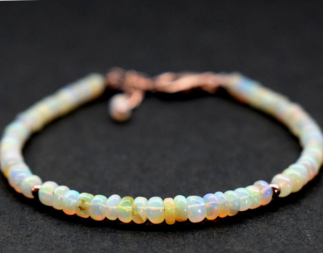 ETHIOPIAN OPAL BRACELET W/ 925 SILVER: These are Natural , earth mined ETHIOPIAN OPAL rondelle shape beads finished with SOLID 925 Sterling Silver lobster clasp (Rose Gold Plated) . All chains and spacers are also Solid 925 Sterling Silver