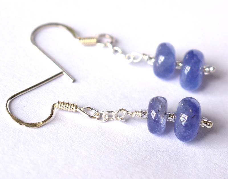 TANZANITE EARRINGS W/ 925 STERLING SILVER: These are Natural , earth mined and hand crafted with precision TANZANITE RONDELLE SHAPED BEADED EARRING with SOLID 925 Sterling Silver wire and hooks.Total length is 1 3/8". Size of stone - 6.5 - 7.5