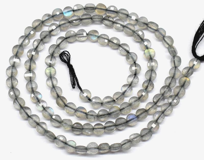 LABRADORITE FACETED COIN BEADS 16" LINE: These are Natural , earth mined and hand crafted with precision Natural fine quality LABRADORITE FACETED COIN BEADS . Total length is 16". Size of stone : 4 mm , Width : 2.5 mm . Total Weight - 32 car