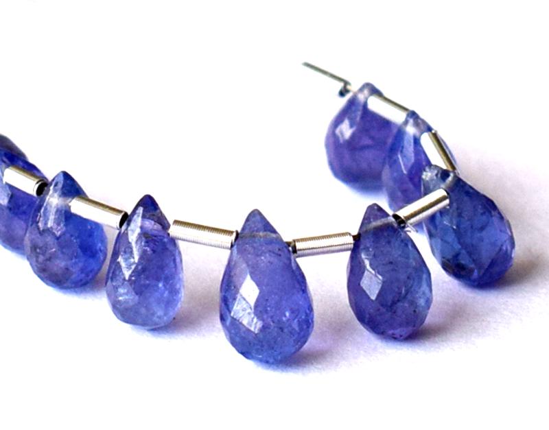 TANZANITE - BRIOLETTES 4X6 mm - TASSEL: " TASSEL"- means the drilled pieces of gemstones are loosely attached with a wire , ideally you can use it to create of of a kind jewelry . STONE : NATURAL EARTH MINED TANZANITE PLAIN TEAR DROP BRIOLE