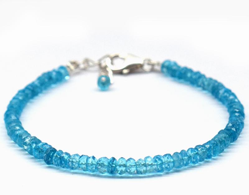 NATURAL TOPAZ BRACELET W/ 925 SILVER: These are Natural , earth mined BLUE TOPAZ faceted rondelle shape beads finished with SOLID 925 Sterling Silver lobster clasp. All chains and spacers are also Solid 925 Sterling Silver. Clasp is adjus