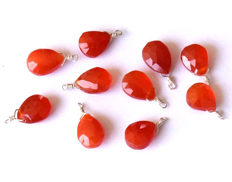 CARNELIAN - FACETED PEARS - 925 SILVER LOOPS: These are Natural, earth mined and hand crafted with precision CARNELIAN FACETED PEAR SHAPE BRIOLETTES beads . (10 pieces ) Wrapped in SOLID 925 Sterling Silver wire loops, perfect for making earring 