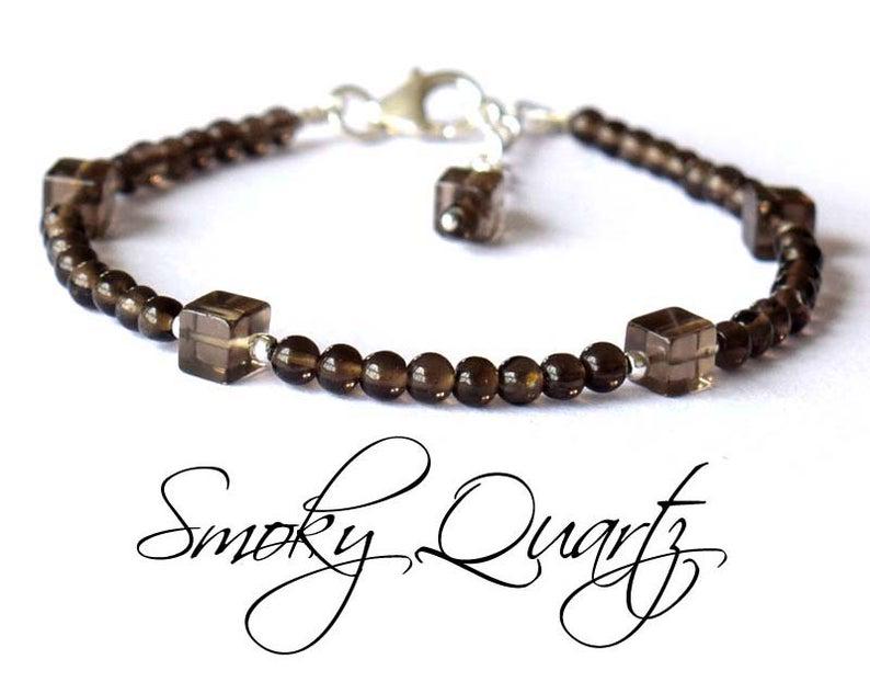 SMOKY QUARTZ BRACELET W/ 925 SILVER: These are Natural , earth mined SMOKY QUARTZ plain round and box shape beads finished with SOLID 925 Sterling Silver lobster clasp. All chains and spacers are also Solid 925 Sterling Silver. Clasp is 