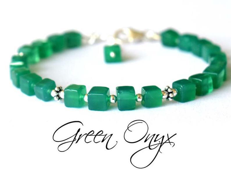 GREEN ONYX BRACELET W/ 925 STERLING SILVER: These are Natural , earth mined GREEN ONYX box shape beads finished with SOLID 925 Sterling Silver lobster clasp. All chains and spacers are also Solid 925 Sterling Silver. Clasp is adjustable from 7"