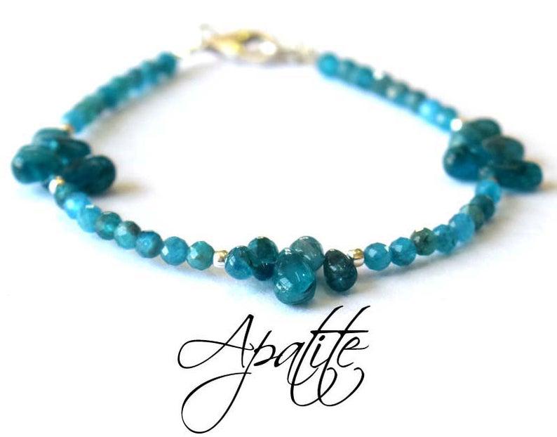 NEON APATITE BRACELET W/ 925 STERLING SILVER: These are Natural , earth mined NEON APATITE faceted round and briolette shape beads finished with SOLID 925 Sterling Silver lobster clasp. All chains and spacers are also Solid 925 Sterling Silver. B