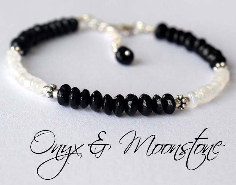 MOONSTONE N ONYX BRACELET W/ 925 STERLING SILVER: These are Natural , earth mined RAINBOW MOONSTONE AND BLACK ONYX rondelle shape beads finished with SOLID 925 Sterling Silver lobster clasp. All chains and spacers are also Solid 925 Sterling Silver.