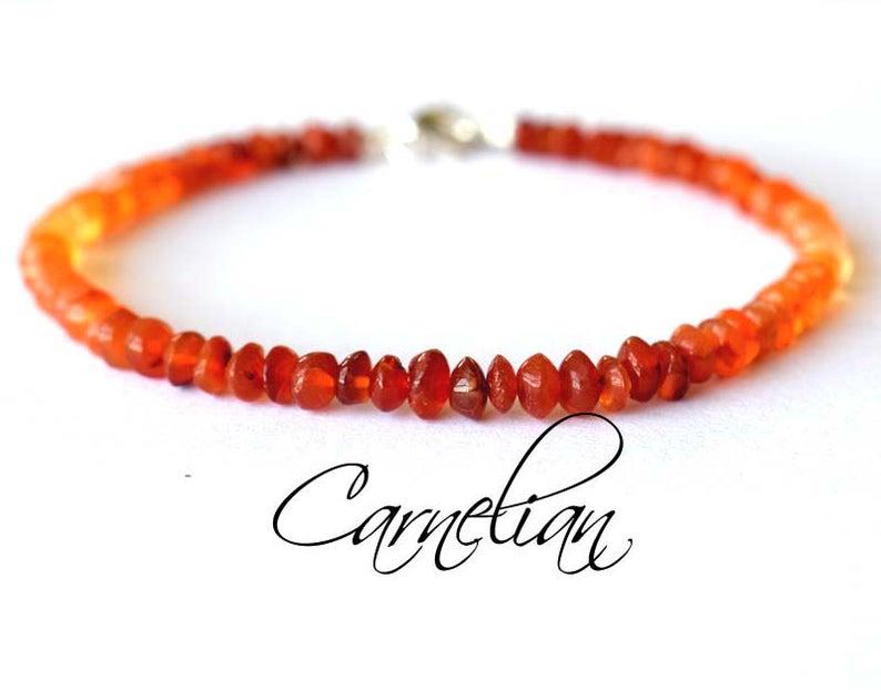 CARNELIAN BRACELET W/ 925 STERLING SILVER: These are Natural , earth mined SHADED CARNELIAN rondelle shape beads finished with SOLID 925 Sterling Silver lobster clasp. All chains and spacers are also Solid 925 Sterling Silver. Bracelet length 