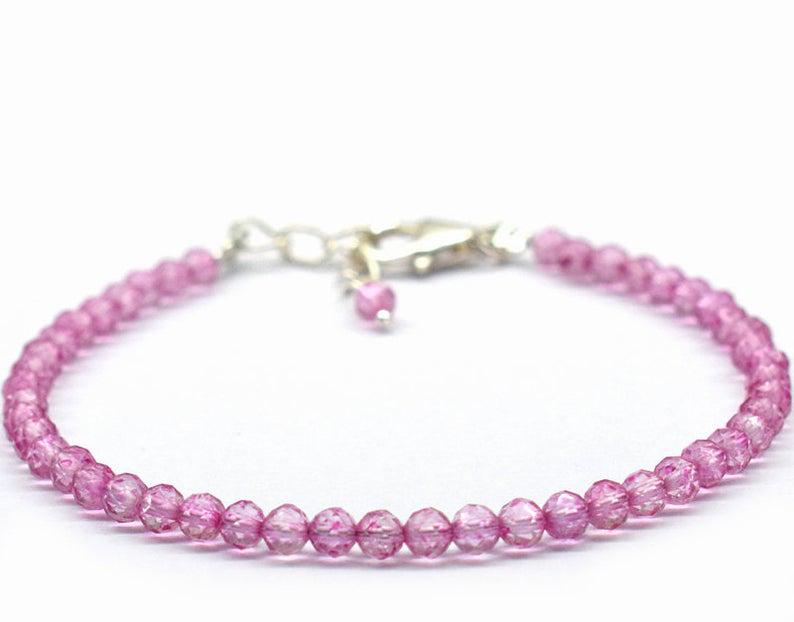 PINK TOPAZ BRACELET W/ 925 STERLING SILVER: These are Natural , earth mined PINK TOPAZ faceted round shape beads finished with SOLID 925 Sterling Silver lobster clasp. All chains and spacers are also Solid 925 Sterling Silver. Clasp is adjustab