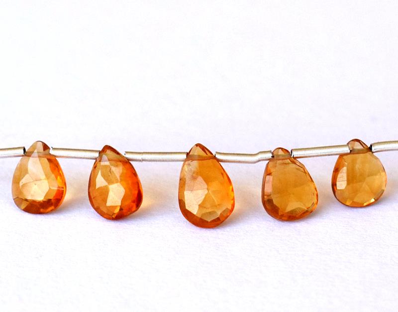 FINE CITRINE - BRIOLETTES 6X7 - 6X8 mm - TASSEL: " TASSEL"- means the drilled pieces of gemstones are loosely attached with a wire , ideally you can use it to create of of a kind jewelry . STONE : NATURAL FINE GOLDEN CITRINE FACETED PEAR BRIOLETTE B