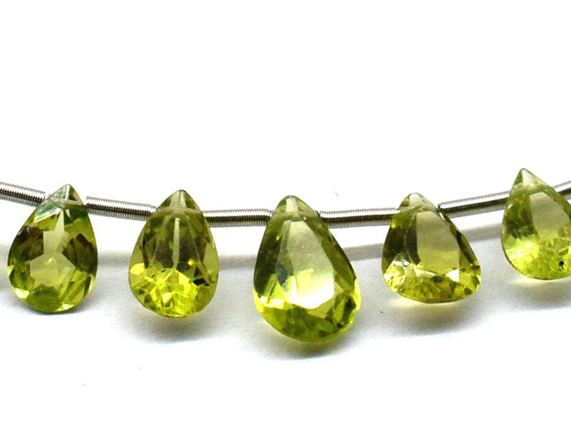 PERIDOT - PEAR 5X6 - 6X9 mm - TASSEL: " TASSEL"- means the drilled pieces of gemstones are loosely attached with a wire , ideally you can use it to create of of a kind jewelry . STONE : NATURAL EARTH MINED FINE PERIDOT BRIOLETTE PEAR SHAP