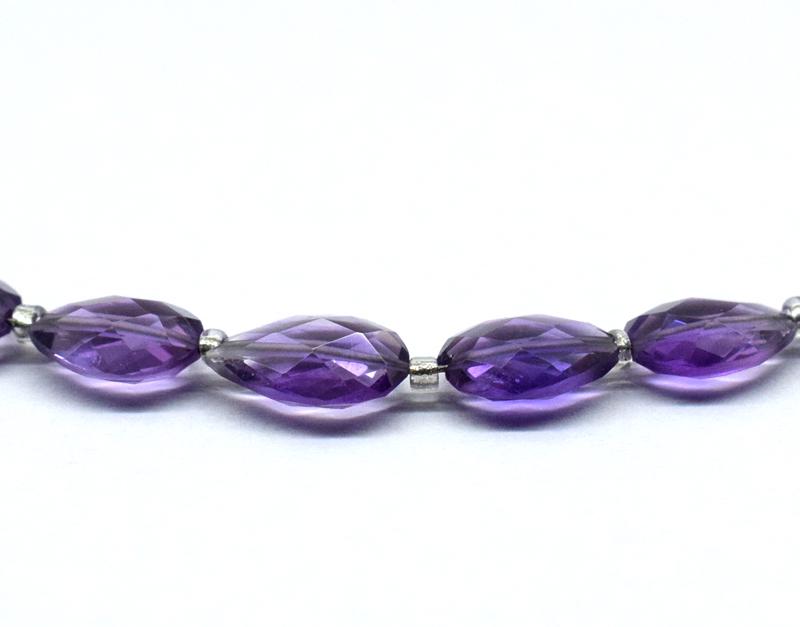 AMETHYST FACETED PEAR 6x8 mm - TASSEL: " TASSEL"- means the drilled pieces of gemstones are loosely attached with a wire , ideally you can use it to create of of a kind jewelry . STONE : NATURAL GEM QUALITY AMETHYST FACETED PEAR BEADS . Al