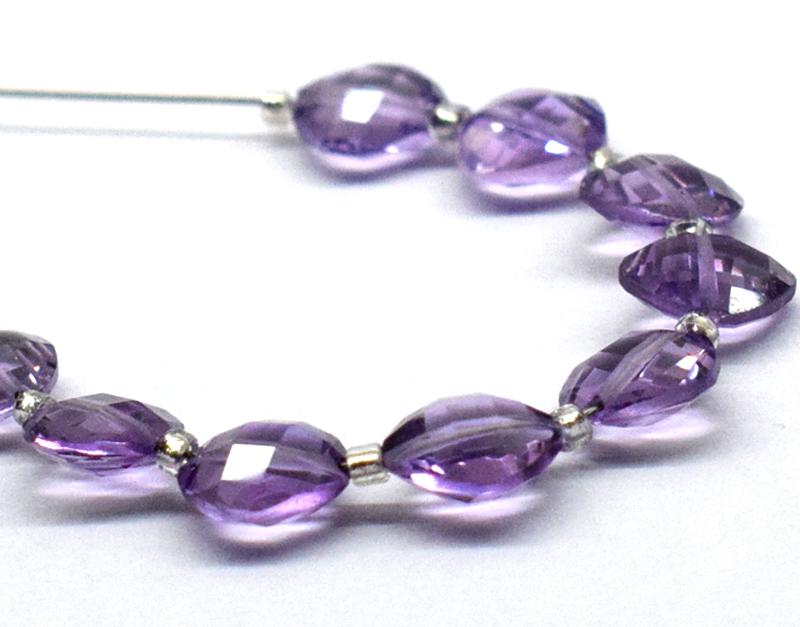 AMETHYST FACETED CUSHION 7x7mm - TASSEL: " TASSEL"- means the drilled pieces of gemstones are loosely attached with a wire , ideally you can use it to create of of a kind jewelry . STONE : NATURAL GEM QUALITY AMETHYST FACETED CUSHION BEADS .