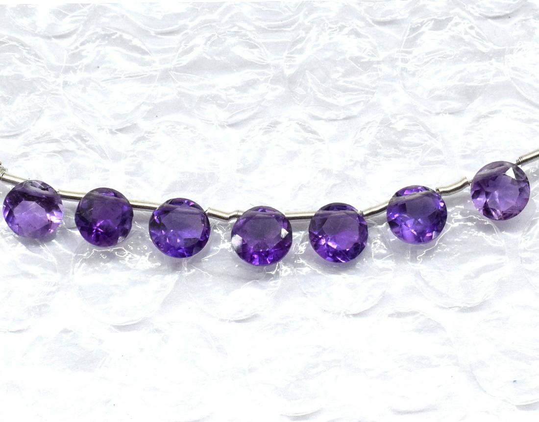 AMETHYST BEADS - FACETED ROUND - TASSEL: " TASSEL"- means the drilled pieces of gemstones are loosely attached with a wire , ideally you can use it to create of of a kind jewelry . STONE : NATURAL EARTH MINED AMETHYST FACETED ROUND SHAPE BEA