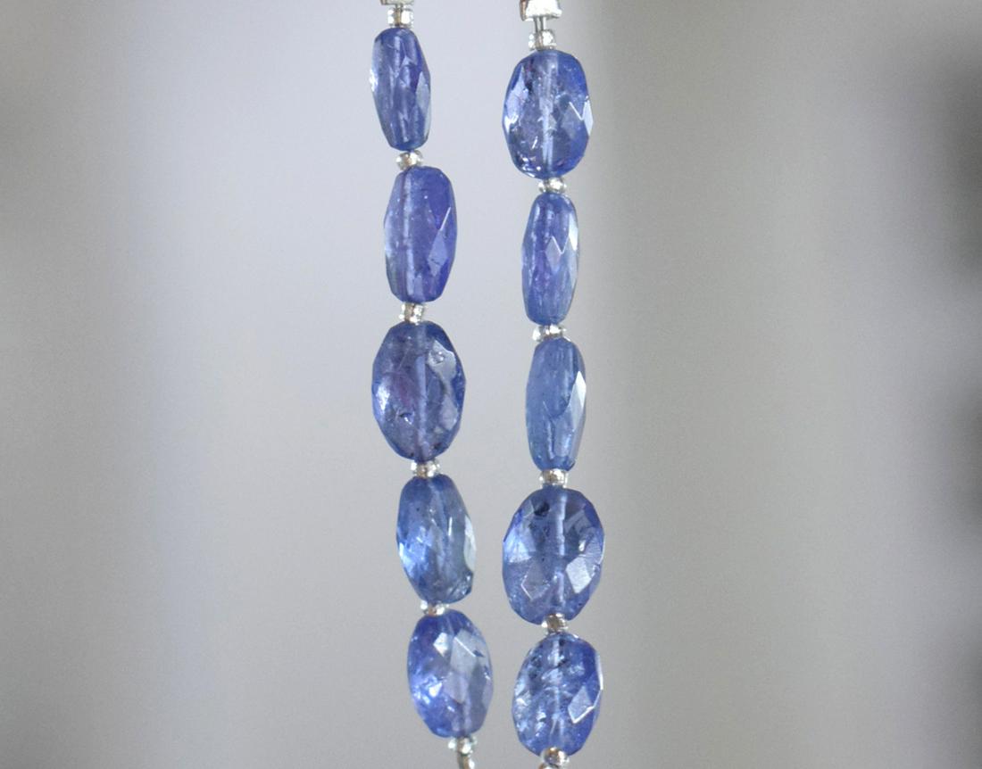 NATURAL TANZANITE - FACETED OVAL 6X8 mm - 2 TASSEL: " TASSEL"- means the drilled pieces of gemstones are loosely attached with a wire , ideally you can use it to create of of a kind jewelry . STONE : NATURAL GEM QUALITY EARTH MINED TANZANITE FACETED OV