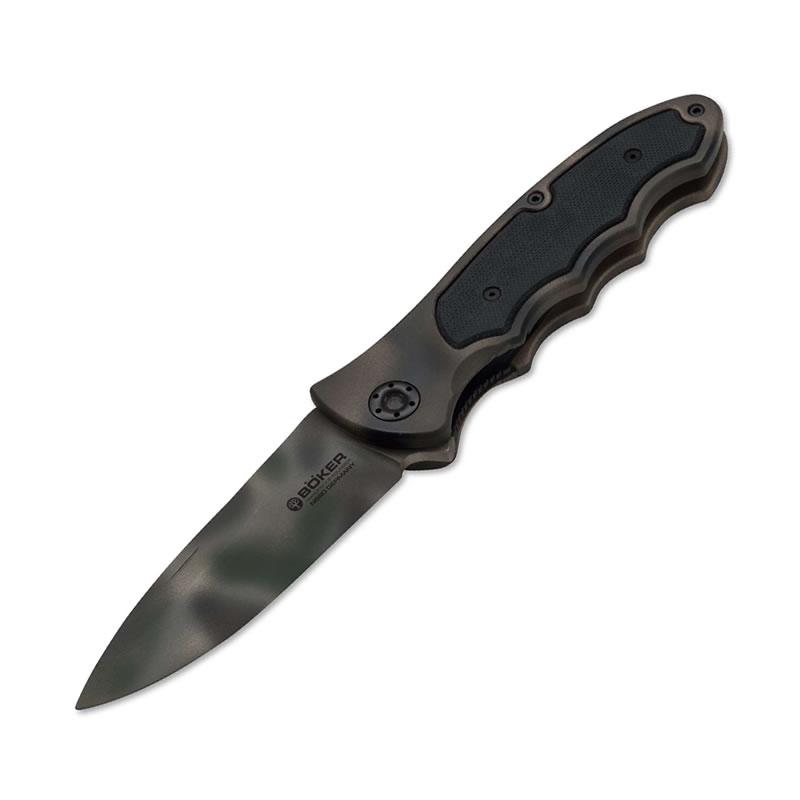 Boker TF/W: Boker TF/W **|**|** As a two-handed version based on our popular Turbine 42 the tactical folder/Woodland also has plenty of potential as an everyday companion in urban settings. ?A black G-10 inlay wi