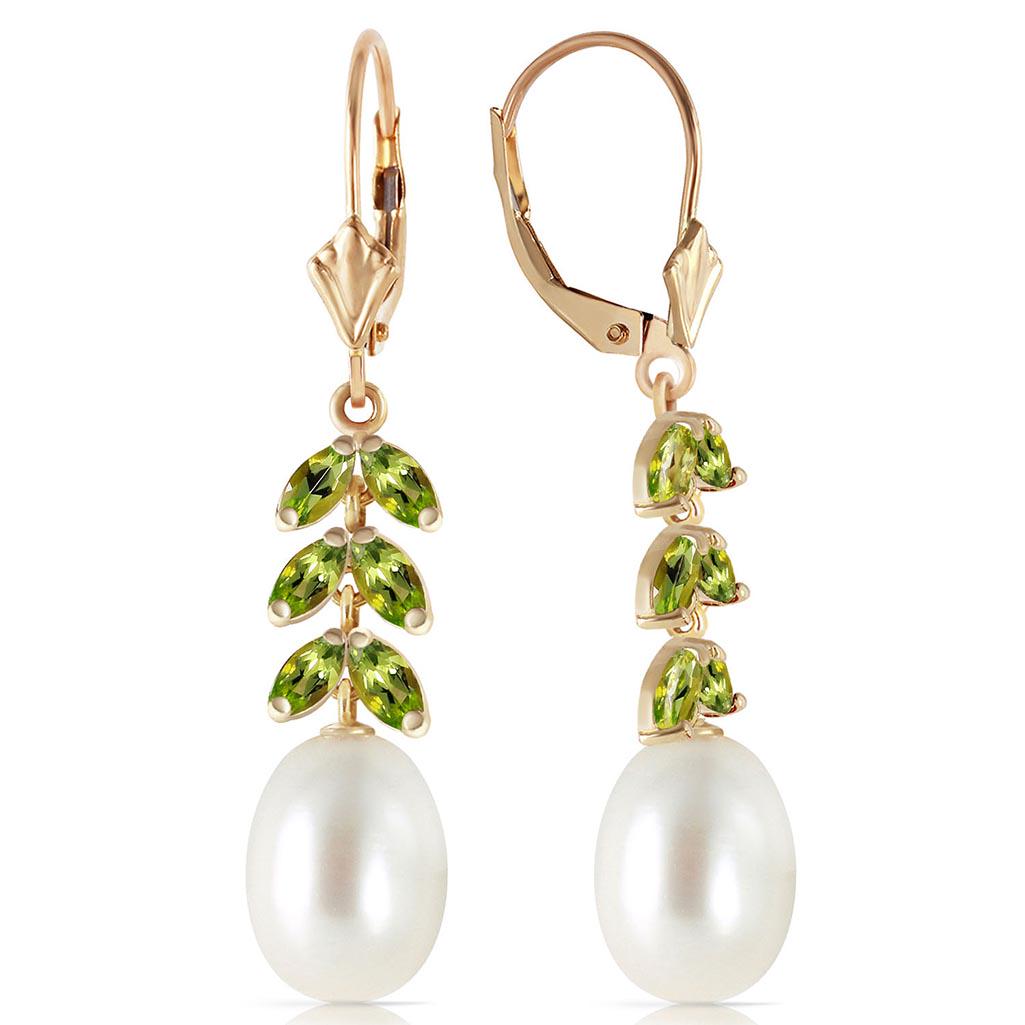 9.2 Carat 14K Solid Gold Momentum pearl Peridot Earring: 9.2 Carat 14K Solid Gold Momentum pearl Peridot Earrings **|**|** Peridot / Pearl; Metal Color:Yellow Gold; Condition: New With Tags; TWC: 9.2 ;Metal: 14 K. Solid Yellow Gold ;Stone: Natural; Width: 0