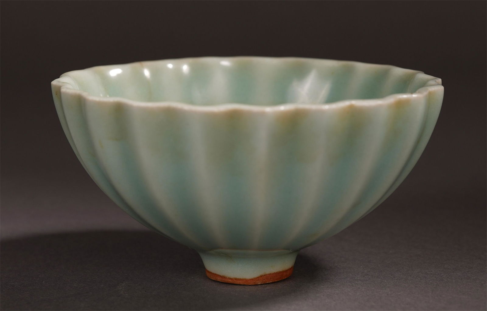 A CHINESE PORCELAIN CELADON GLAZE OGEE FORM BOWL (1 of 9)