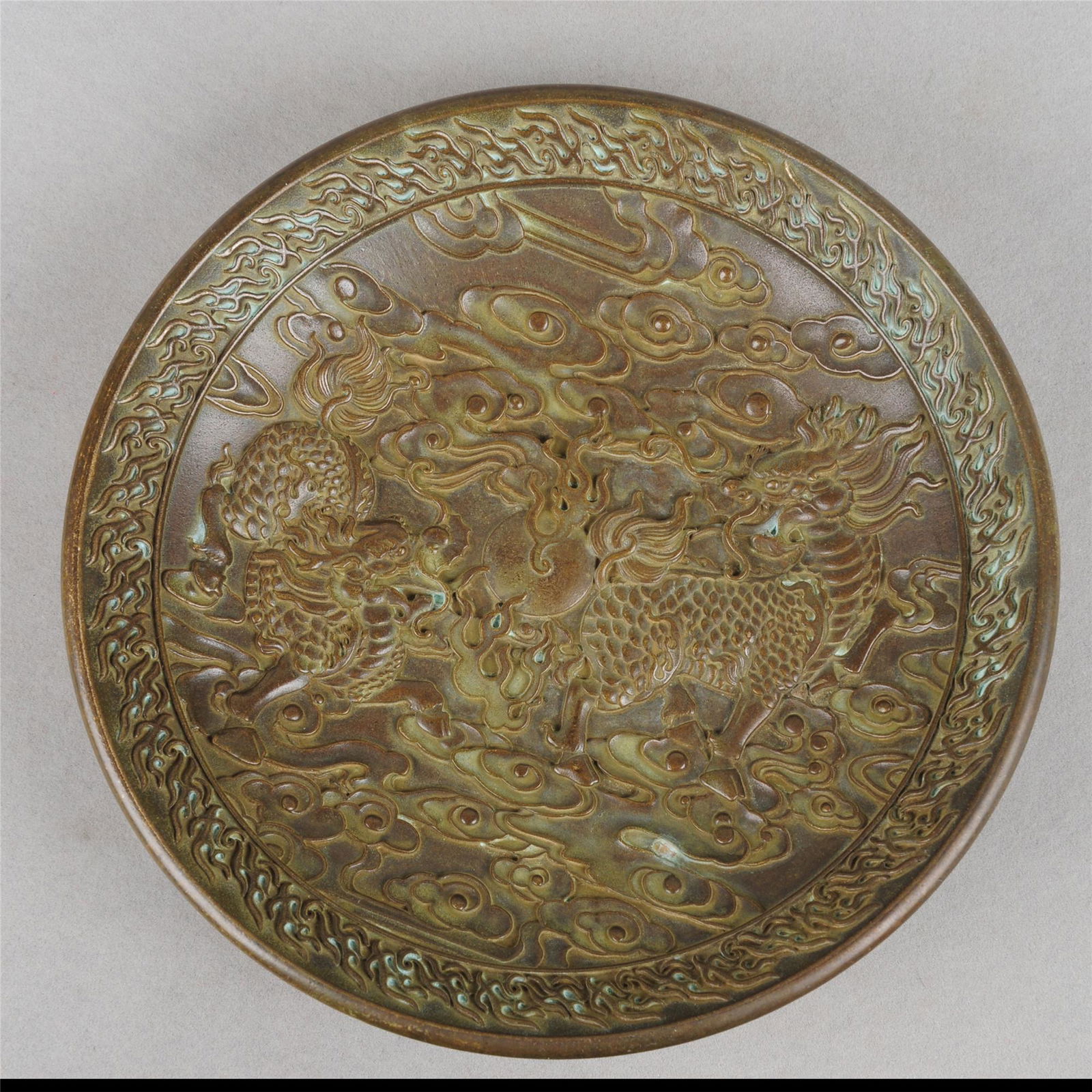 A CHINESE BRONZE BEAST PLATE (1 of 4)