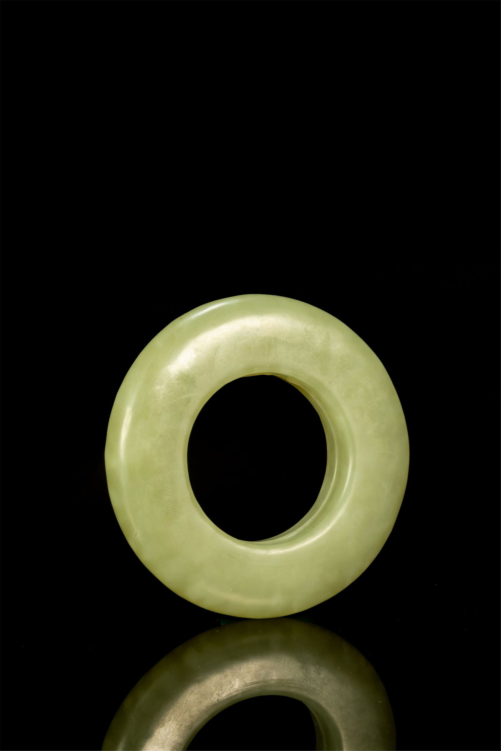 A CHINESE CELADON JADE RING CIRCLE (1 of 6)