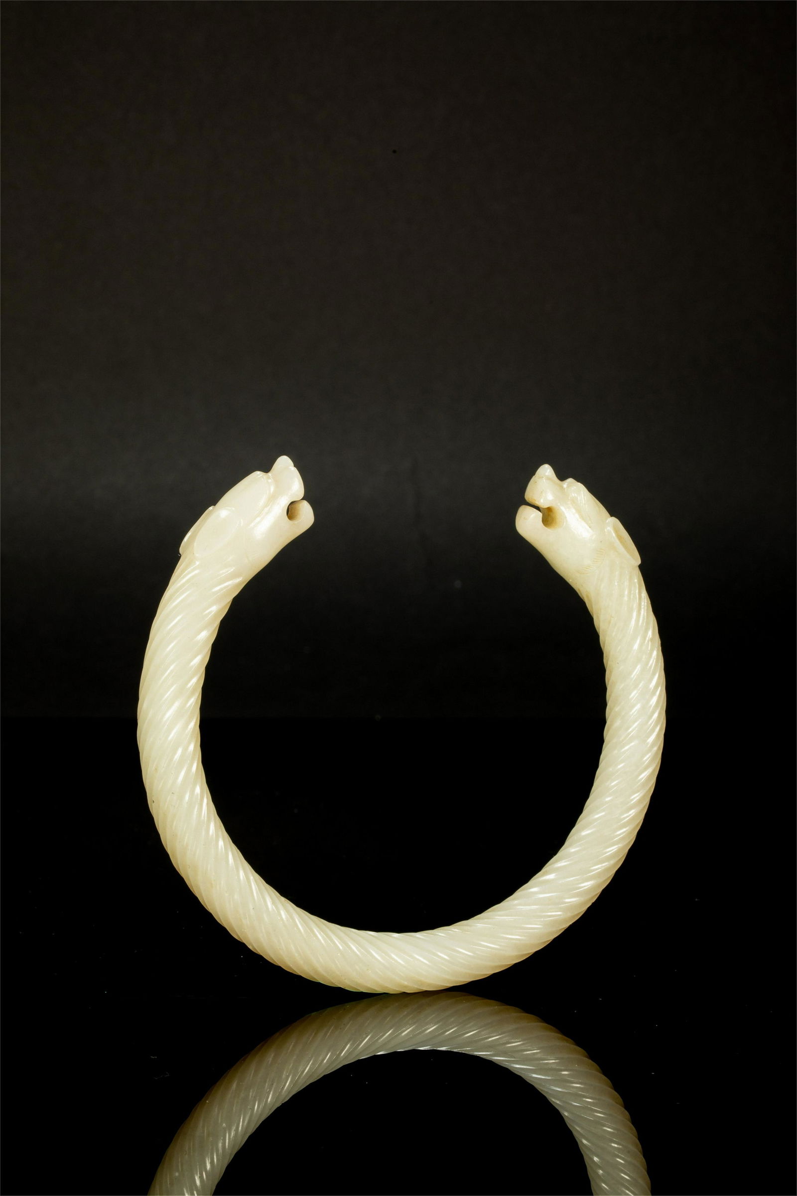 A CHINESE WHITE JADE DRAGON BANGLE (1 of 10)