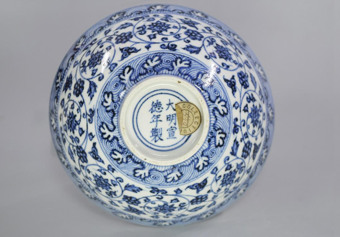 CHINESE PORCELAIN BLUE AND WHITE FLOWER BOWL MING: CHINESE PORCELAIN BLUE AND WHITE FLOWER BOWL MING DYNASTY FROM ASIAN COLLECTION FROM LOWER MERION PENNSYLVANIA. Six character marker of Xuande of Ming dynasty on the bottom. With two lables from Rowe 