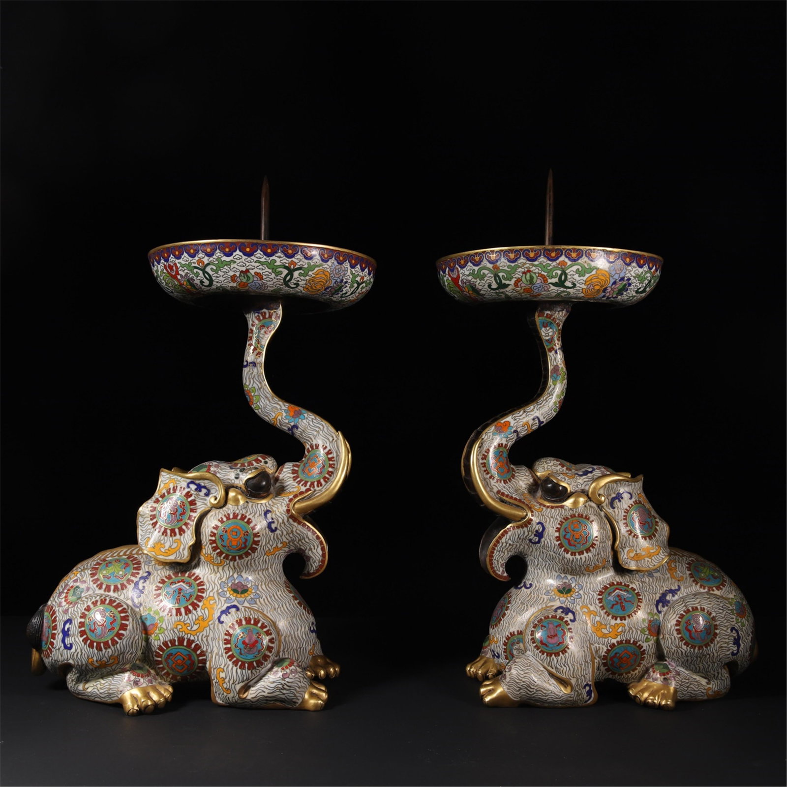 PAIR OF CHINESE CLOISONNE ELEPHANT CANDLE HOLDERS: PAIR OF CHINESE CLOISONNE ELEPHANT CANDLE HOLDERS. H. 47 cm. Bottom L. 28 cm. Shipping cost $200 to US 48 states and $600 for oversea International delivery. Local pickup at our office available but n