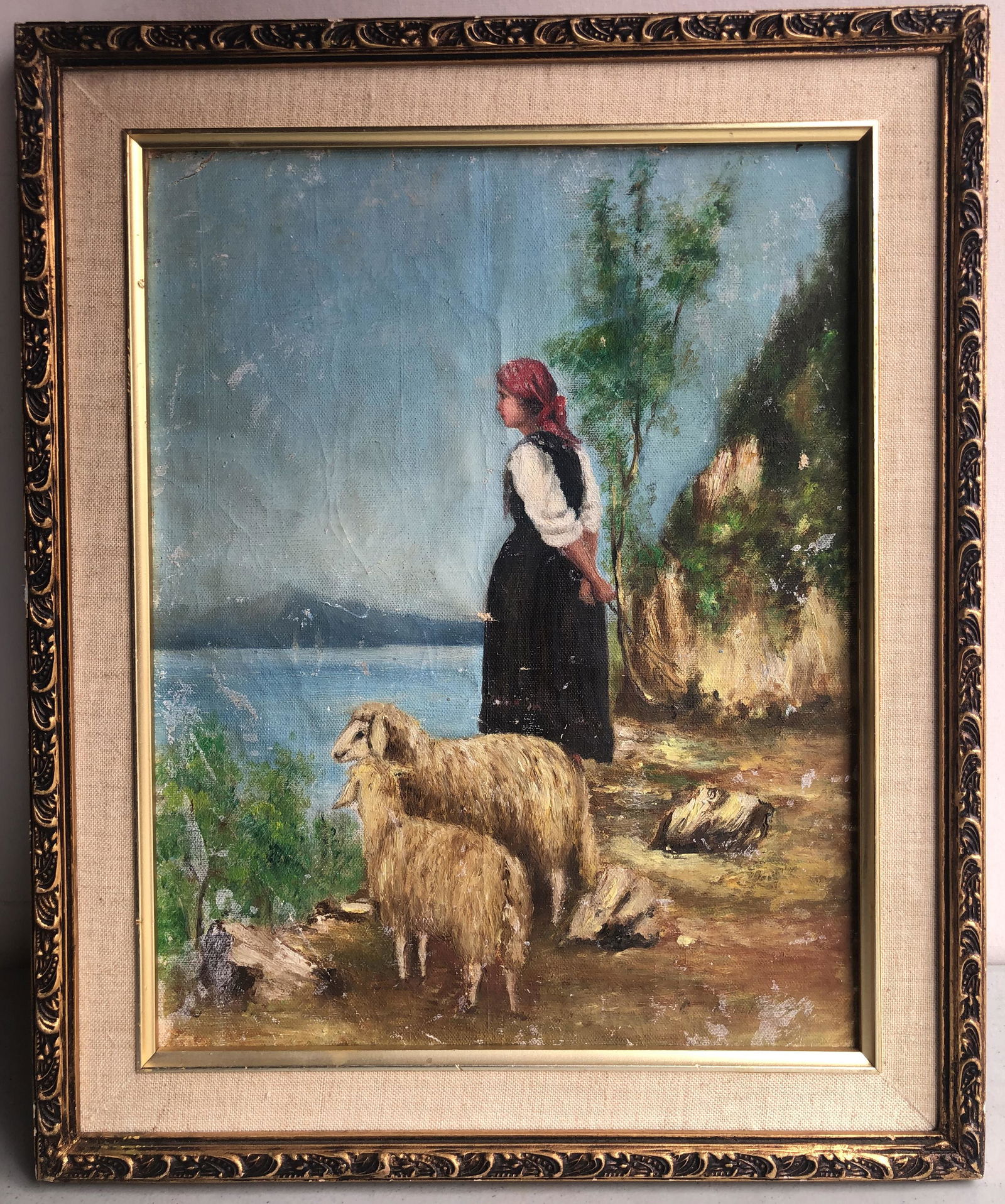 19TH CENTURY EUROPEAN UNSIGNED OIL PAINTING OF GIRL: 19TH CENTURY EUROPEAN UNSIGNED OIL PAINTING OF GIRL WITH SHEEP. Oil on canvas mounted on wood board. Unsigned. Image size 14in by 10.5in. With frame total size 17in by 14in. Domestic shipping cost is
